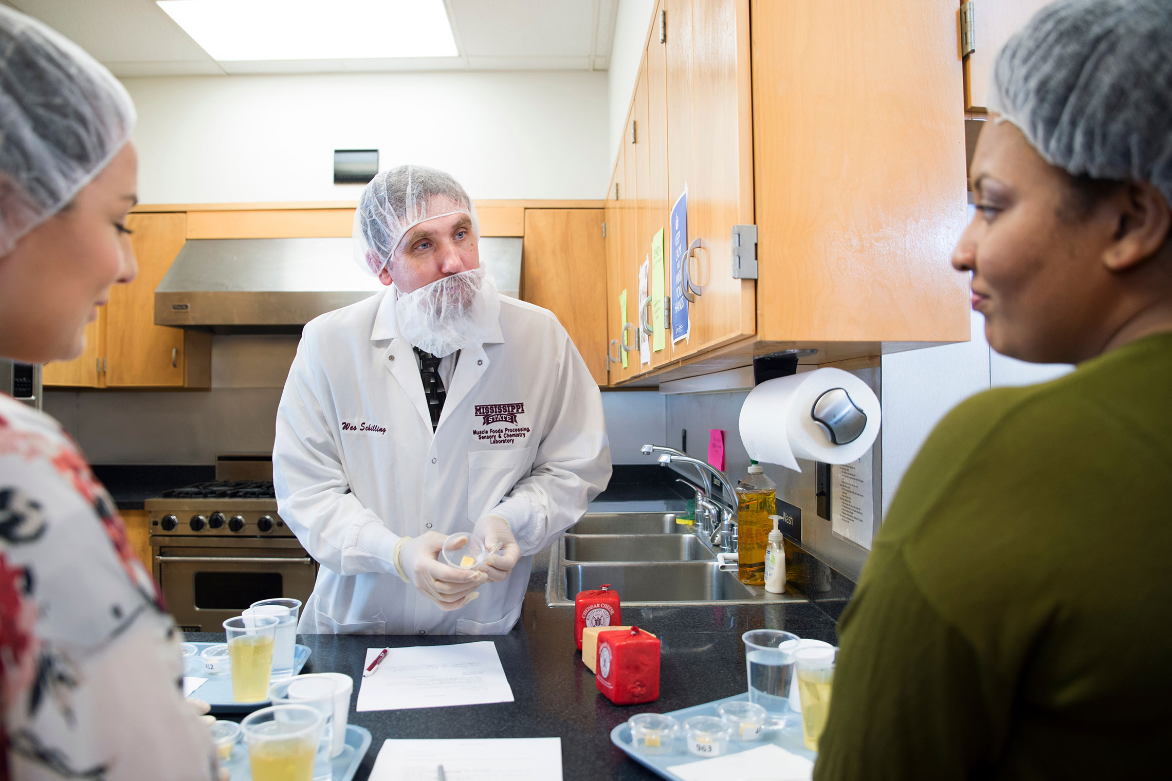 Wes Schilling (center) with students. 